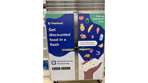 Refrigerator with advertisement to get discounted food in a flash by Flashfood.