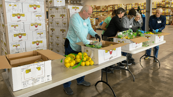 FirstFruits donates 40,000 lbs of apples to food banks with Raley's and Bashas' stores